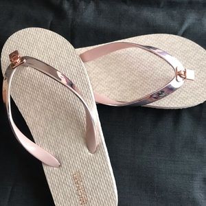 new Michael Kors rose gold flip-flop